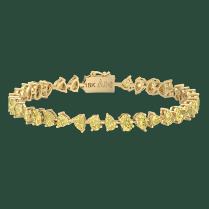 MULTI-SHAPE FANCY YELLOW DIAMOND TENNIS BRACELET